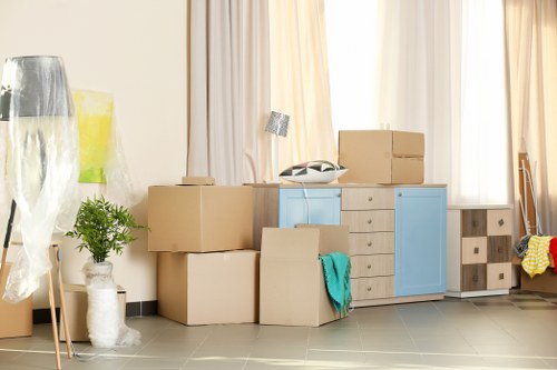 Professionals assisting with house removals in an office environment