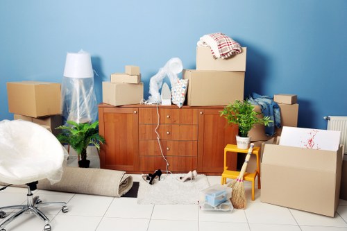 Professional team handling office furniture during a move