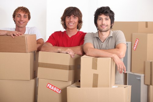 Office equipment being carefully moved by house movers