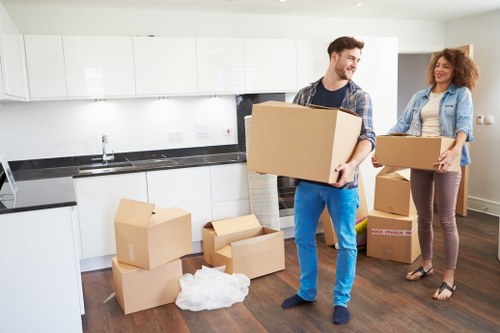 Experienced removalists packing office equipment