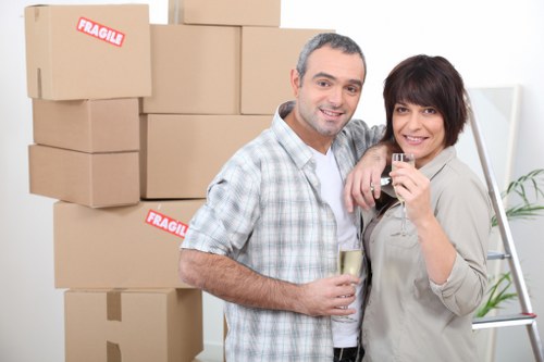 Experienced movers handling office equipment